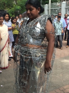 Traditional formal dress -- of sheet metal and barbed wire!